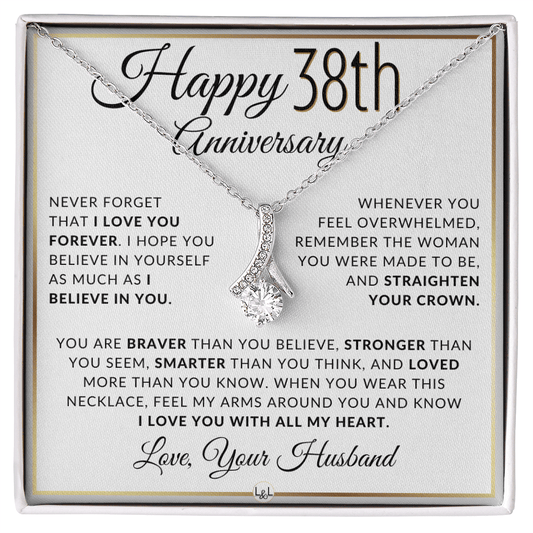 Silver 38th anniversary necklace with a clear rhinestone pendant, presented on a square white gift card with sentimental text and the title 'Happy 38th Anniversary'.