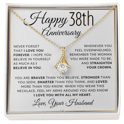 Gold 38th anniversary necklace with a clear rhinestone pendant, presented on a square white gift card with sentimental text and the title 'Happy 38th Anniversary'.